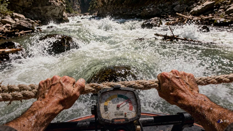 River guide fighting powerful currents representing trend resistance mistakes.